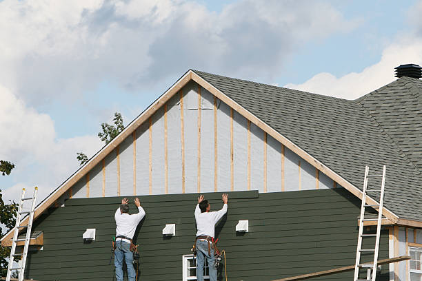 Professional Siding Installation technician working in Milford, IN